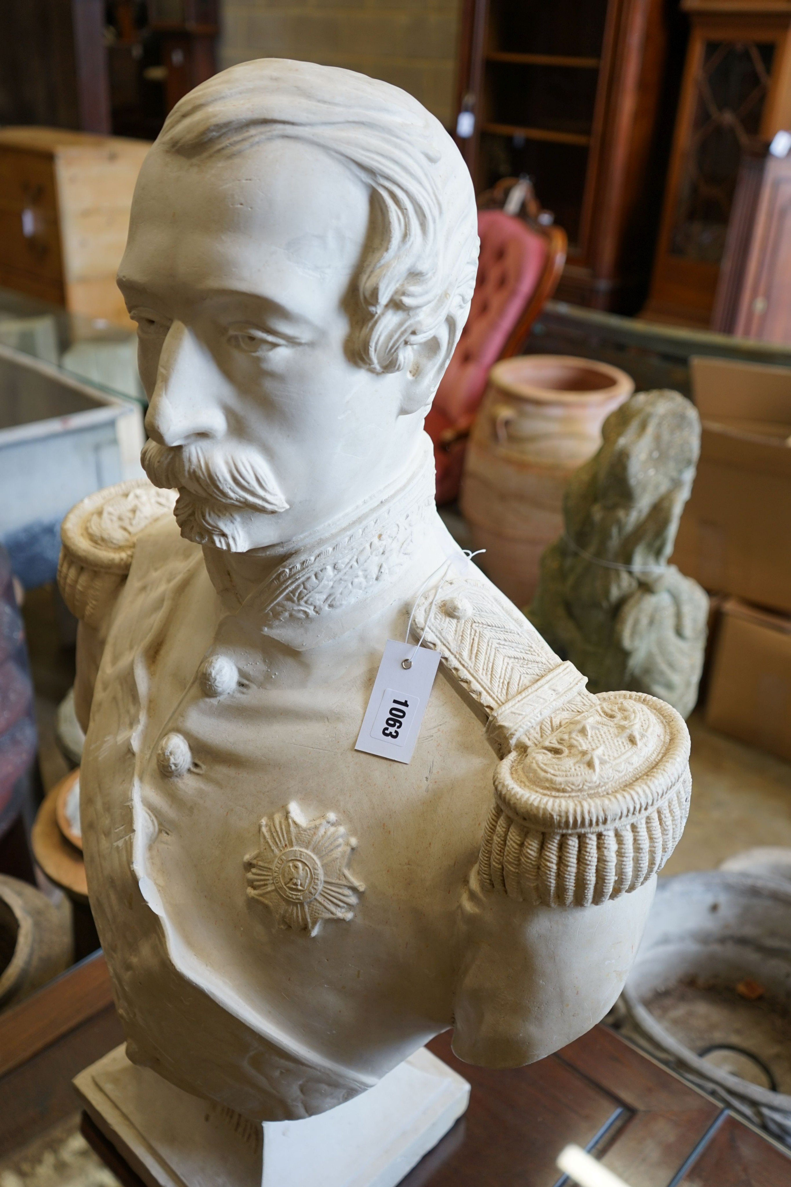 A 'Louis Napolean' faux marble bust, height 82cm